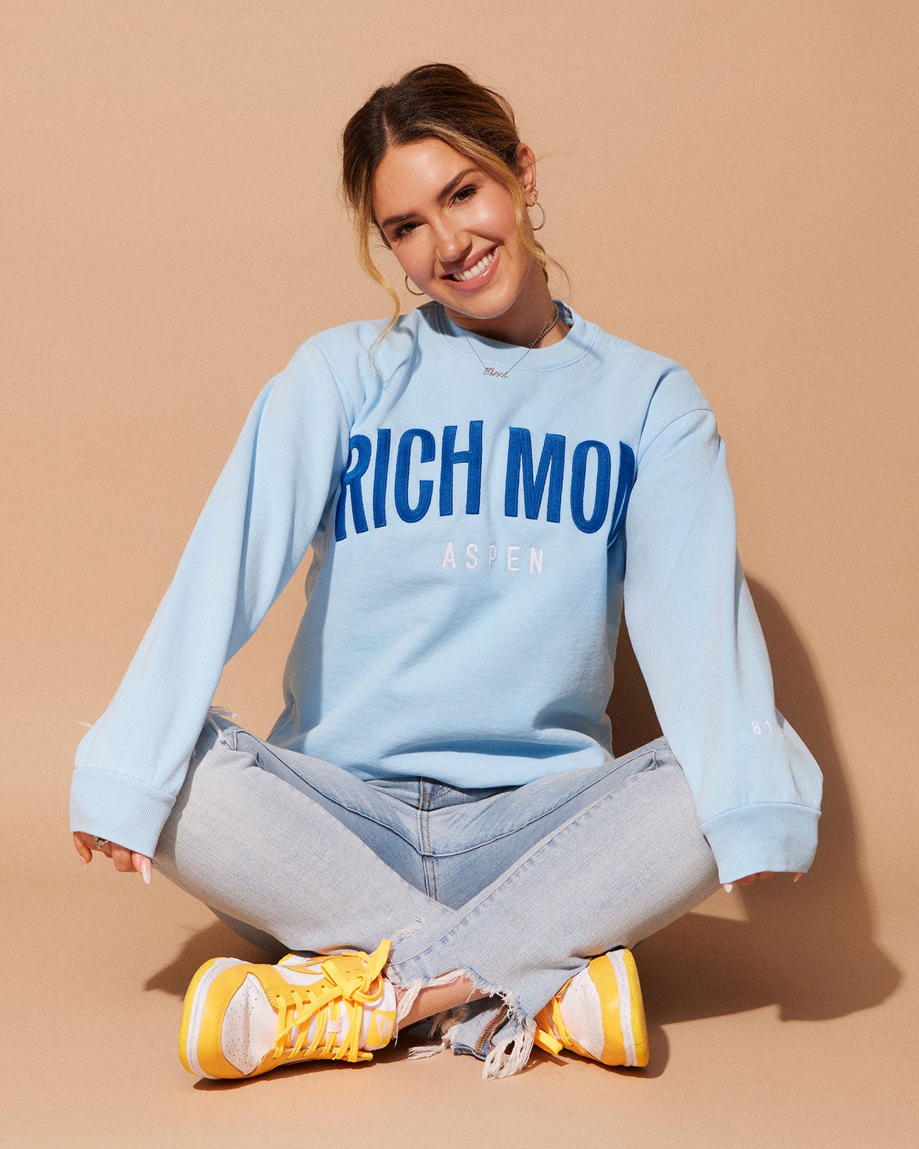 Tinx wears Rich Mom Gear: Aspen