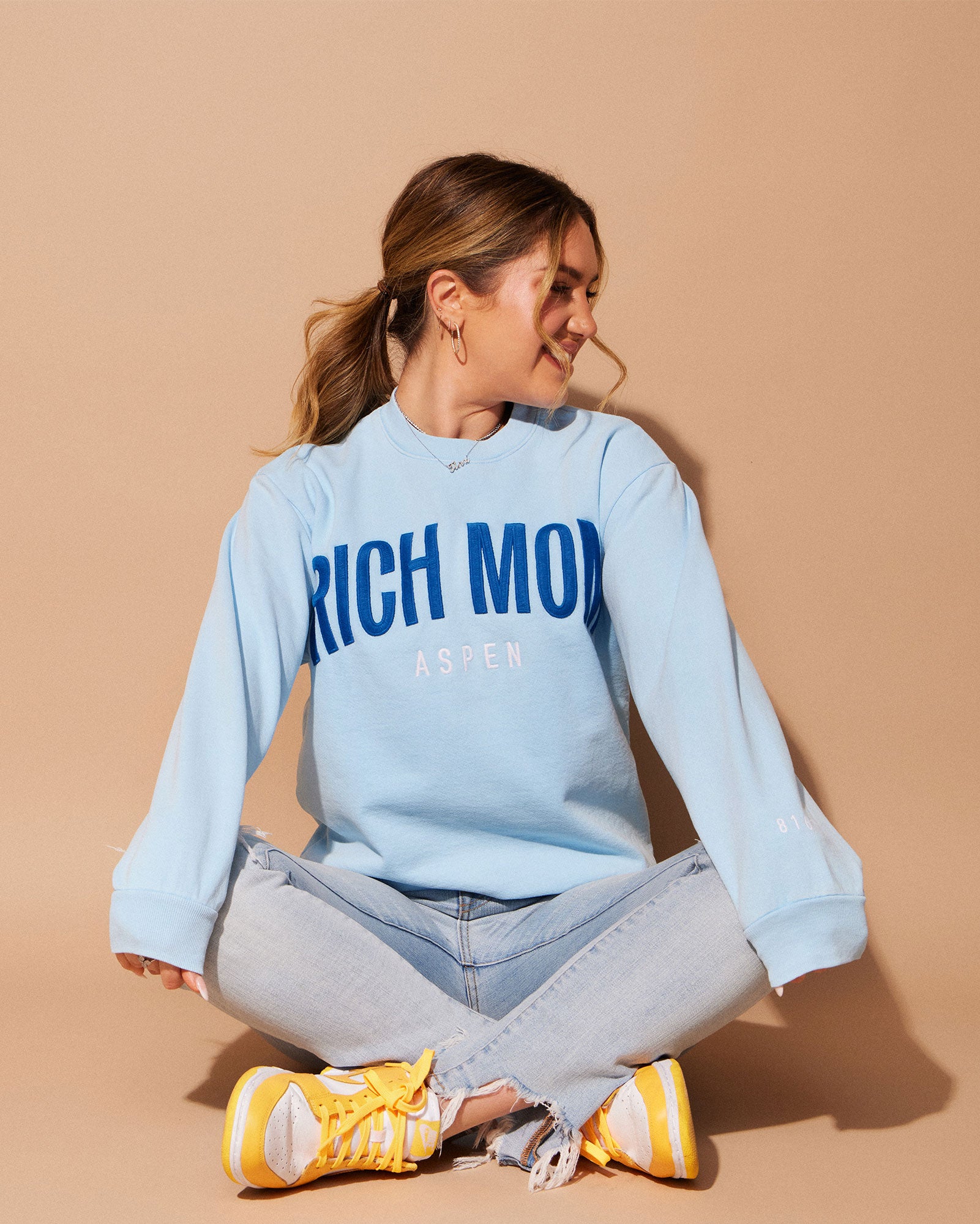 Tinx wears Rich Mom Gear: Aspen