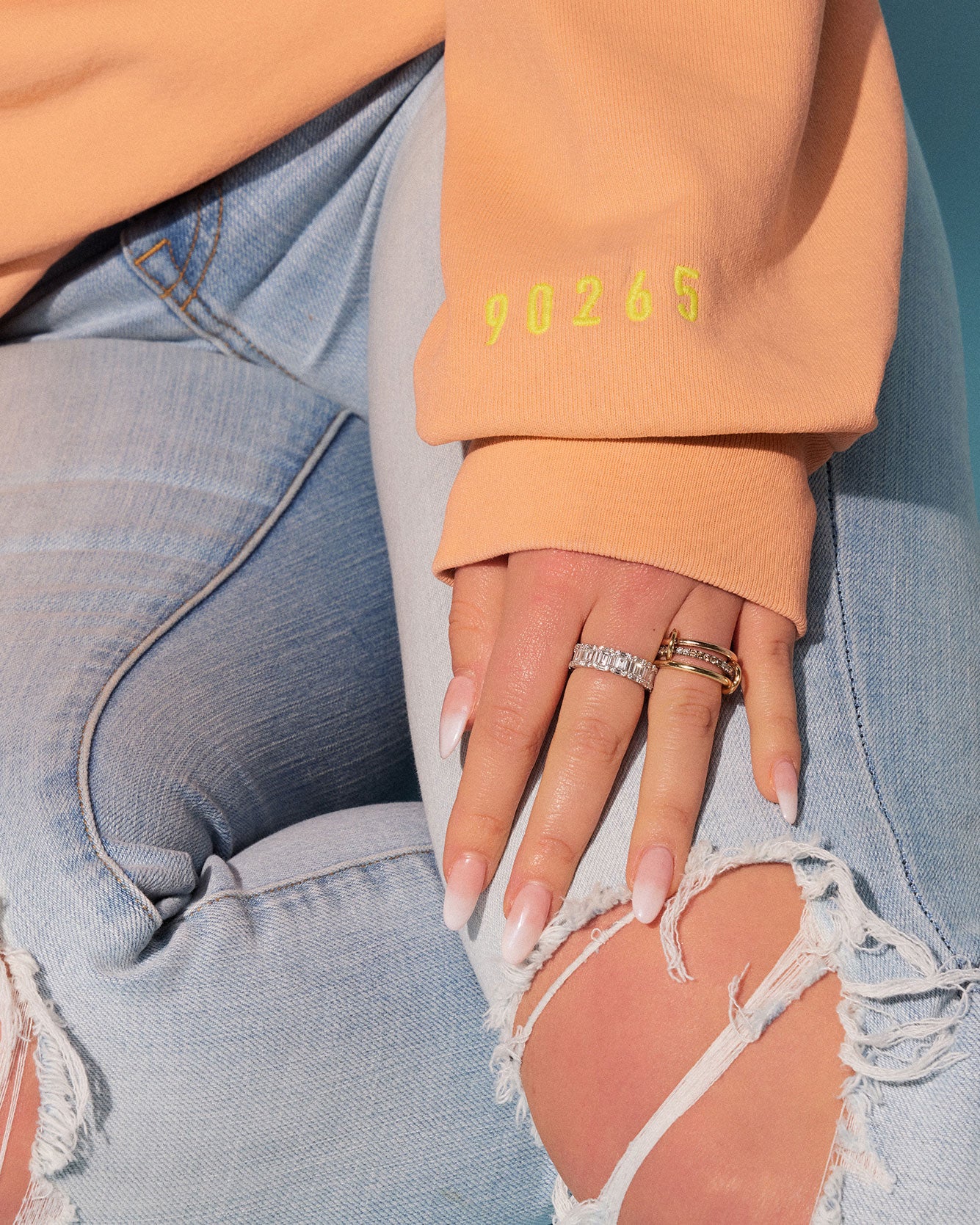 Tinx wears Rich Mom Gear: Malibu