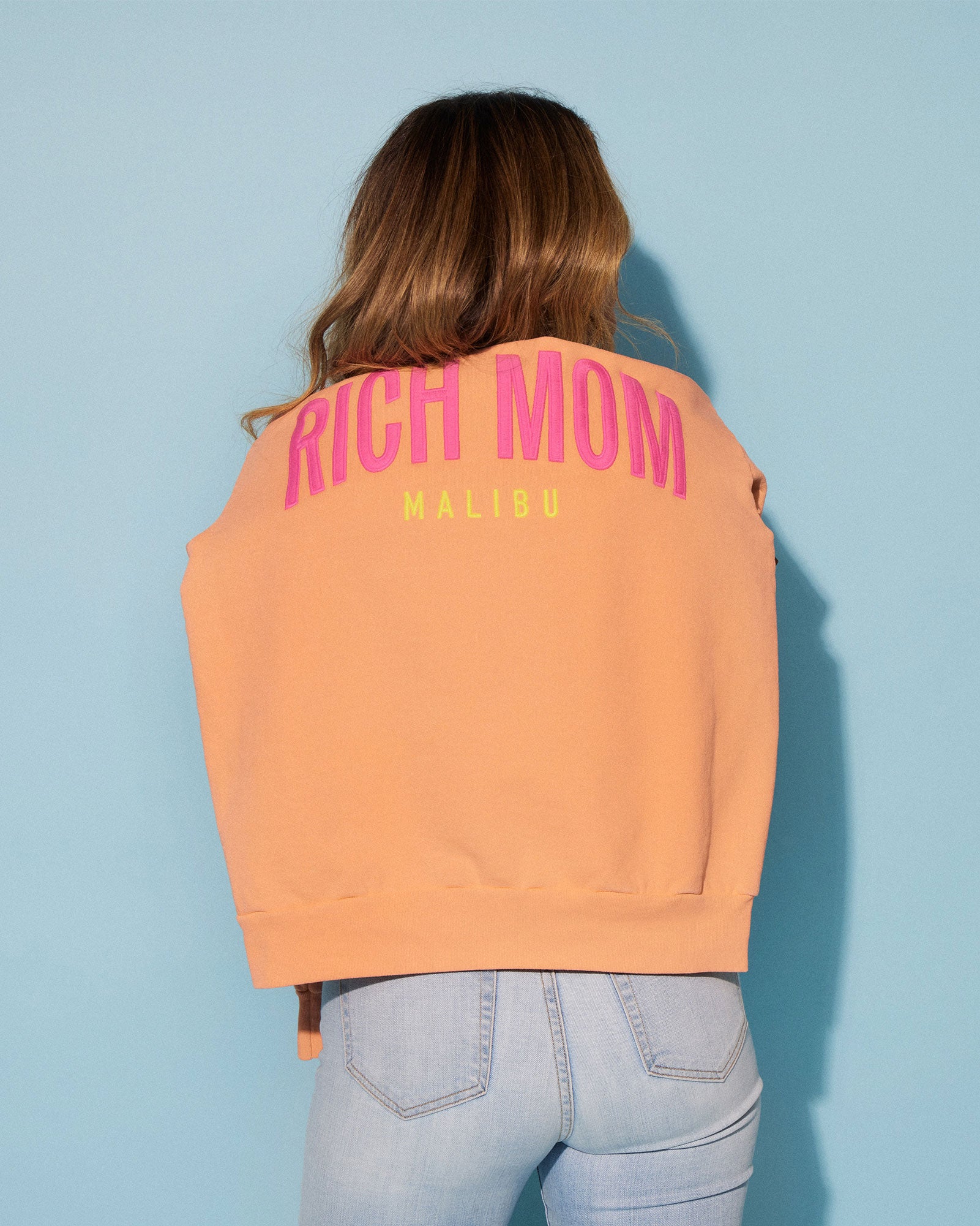 Tinx wears Rich Mom Gear: Malibu