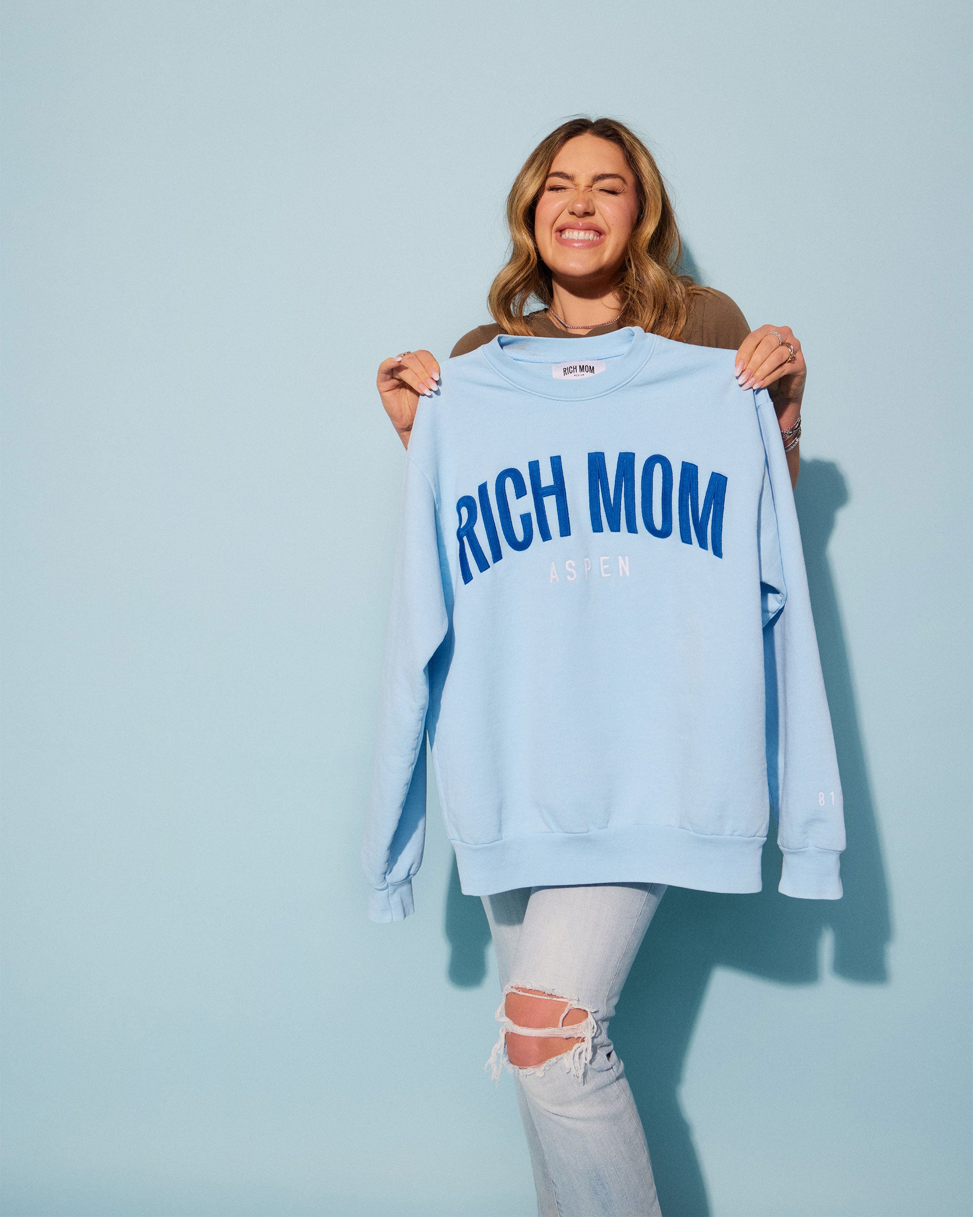 Tinx wears Rich Mom Gear: Aspen