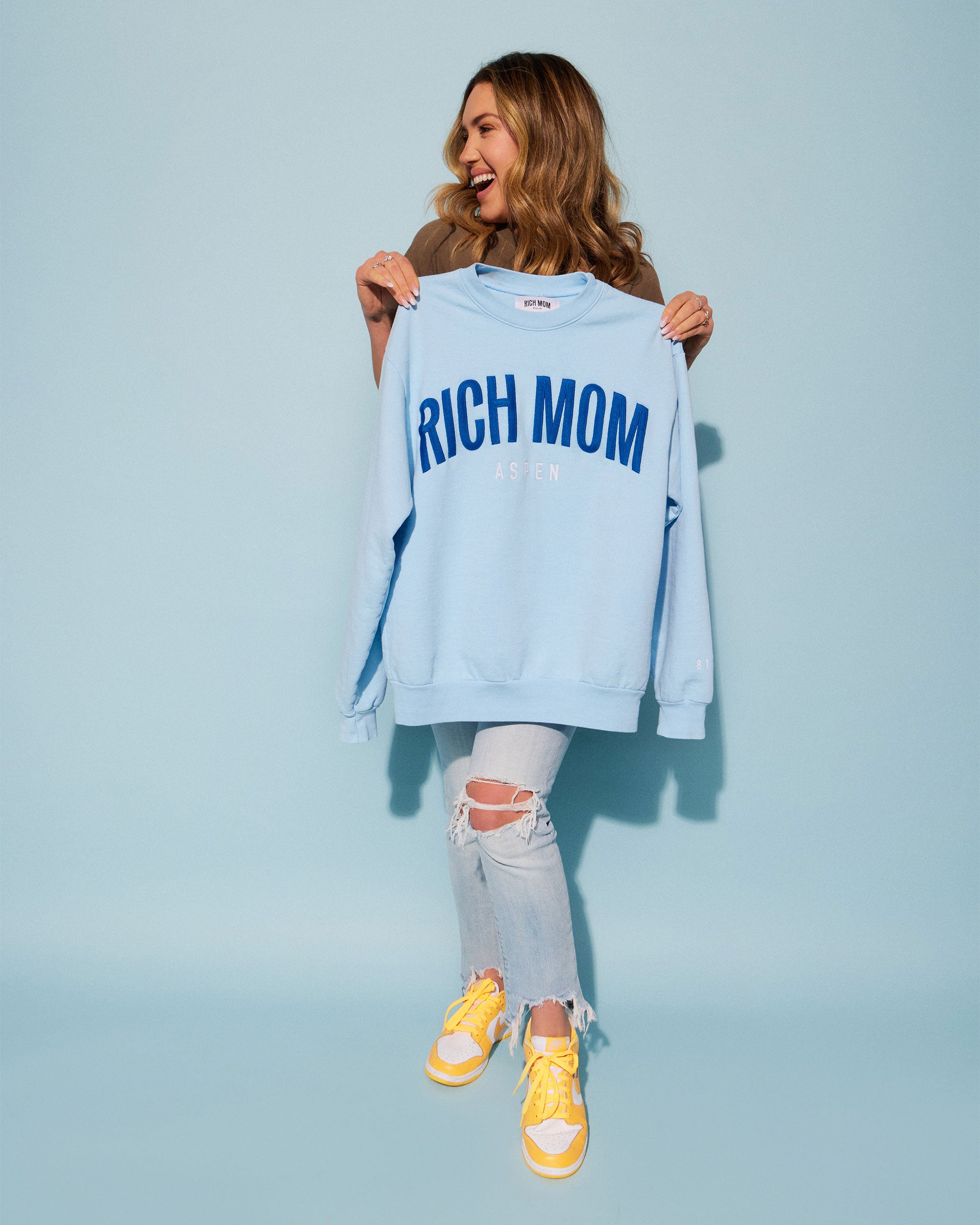 Tinx wears Rich Mom Gear: Aspen