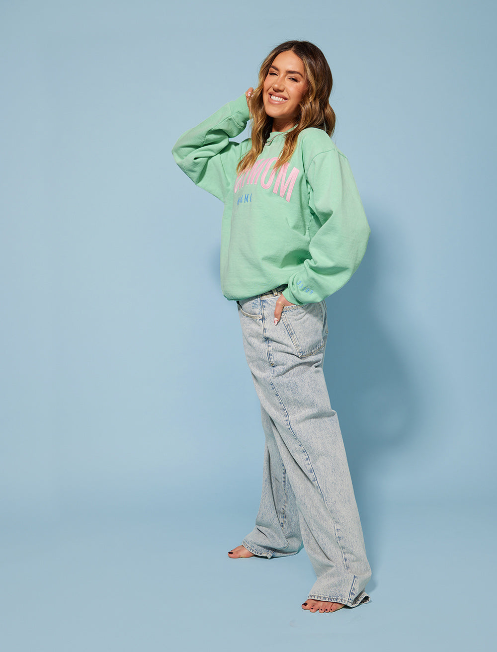 Tinx wears Rich Mom Gear: Miami